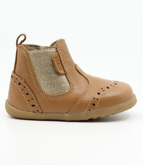 Billie showing the caramel leather upper, brogue details and inside zip.