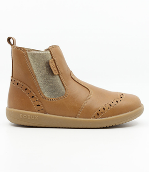 Billie showing the caramel leather upper, brogue details and inside zip.