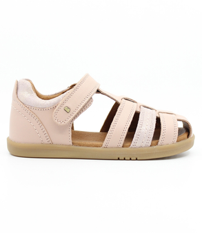 Roam showing the cameo‑rose closed‑toe upper, side openings and ankle strap.
