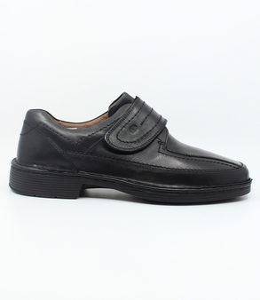 Mens black leather shoe with wide hook and loop strap, stitched detailing and flexible comfort sole.