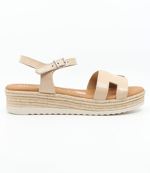 Nude girls’ cut‑out leather platform sandal with ankle strap and cushioned footbed.