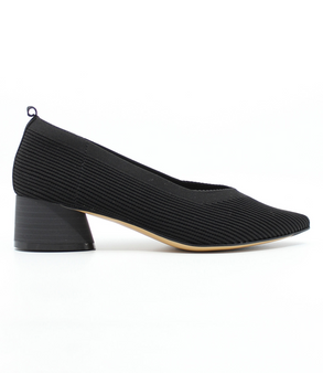 Black women’s ribbed flyknit low‑heel pump with pointed toe and cushioned footbed.