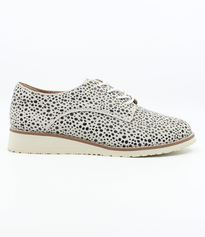Ocelot women's lace-up leather shoe with low wedge and stitched detailing.