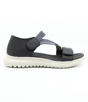 Black women's elastic strap sandal with adjustable fastening, padded insole and flexible outsole.