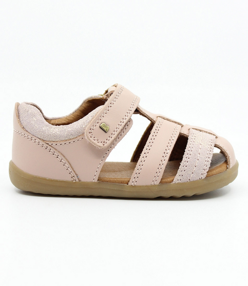 Roam showing the cameo‑rose leather upper, cut‑outs and ankle strap.