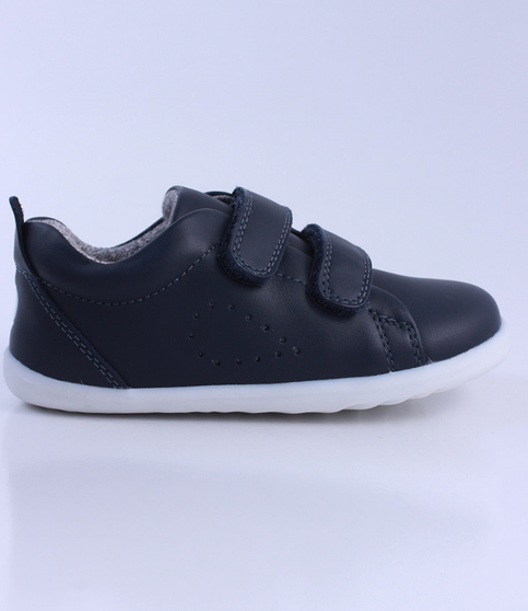 Grass Court showing the navy leather upper, white sole and double straps.