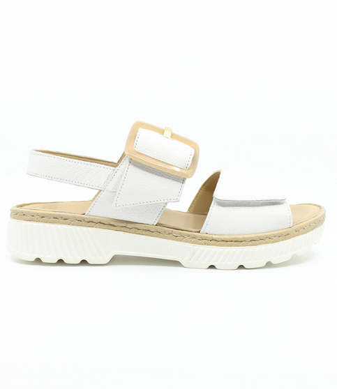 White leather slingback sandal with decorative buckle and flexible side-stitched sole