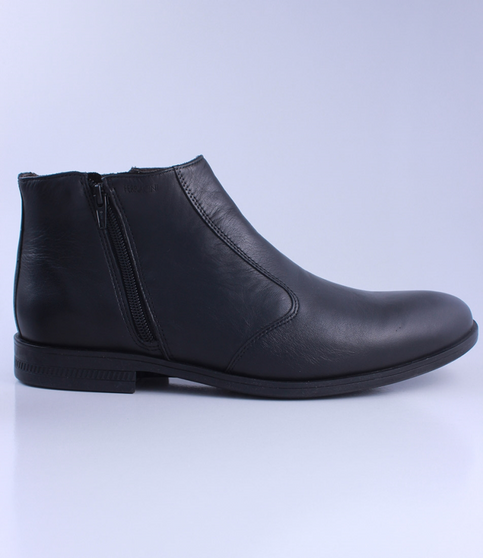 Black men’s leather ankle boot with side zip and cushioned sole.