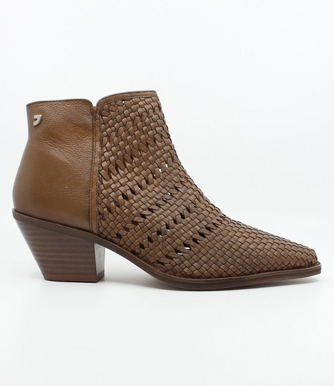 Cuero women’s woven leather ankle boot with pointed toe, side zip and stacked heel.