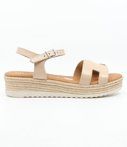 Nude girls’ cut‑out leather platform sandal with ankle strap and cushioned footbed.