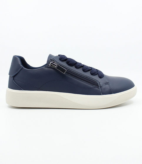 Navy women’s leather casual sneaker with oversized laces, side zip and cushioned footbed.