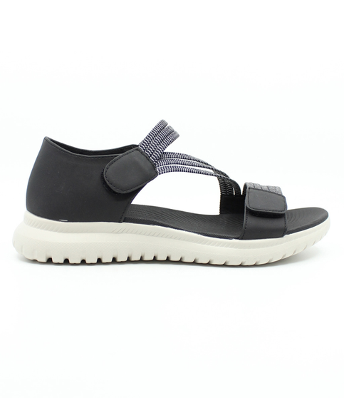 Black women's elastic strap sandal with adjustable fastening, padded insole and flexible outsole.