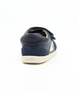 Back view of the Champ showing the navy leather upper, white sole and double straps.