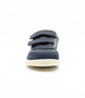 Front view of the Champ showing the navy leather upper, white sole and double straps.