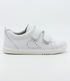 Side view of the Grass Court showing the white leather upper, white sole and double straps.
