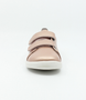 Front view of the Grass Court showing the rose‑gold leather upper, white sole and double straps.