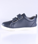 Side view of the Grass Court showing the navy leather upper, white sole and double straps.