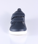 Front view of the Grass Court showing the navy leather upper, white sole and double straps.