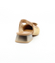 Back view showing the DALI tan slingback with woven raffia front, open back and low heel.