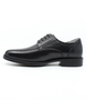 Side view of the MONASH black lace‑up showing rail‑front design and polished finish.