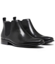 Back view of the KICK black Chelsea boot showing smooth upper and elastic gusset.