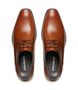 Front view of the KEEN tan Derby showing burnished upper and plain vamp.