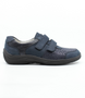 Side view of the HESNA 01 showing the navy leather upper, rounded toe and low-profile sole.