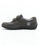 Side view of the HESNA 01 showing the black leather upper, rounded toe and low-profile sole.