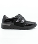 Side view of the RAMONA 31 showing the black patent leather upper, rounded toe and low-profile sole.