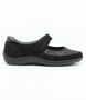 Side view of the HENNI 33 showing the black leather-stretch upper, rounded toe and low-profile sole.
