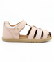 Roam showing the cameo‑rose closed‑toe upper, side cut‑outs and ankle strap.