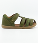 Roam showing the khaki closed‑toe upper, side openings and ankle strap.