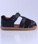 Roam showing the navy closed‑toe upper, side openings and ankle strap.