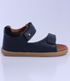 Driftwood showing the navy leather straps, open heel and padded collar.