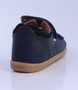 Driftwood showing the navy leather straps, open heel and padded collar.