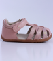 Cross Jump showing the dusk‑pearl and rose‑gold straps and ankle fastening.