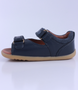 Driftwood showing the navy leather straps, open heel and padded collar.