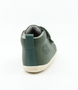 Hi Court showing the forest‑green leather upper, padded collar and multiple straps.