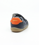 Hunter showing the navy leather upper, orange detailing and double hook‑and‑loop straps.