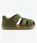 Roam showing the khaki closed‑toe upper, side cut‑outs and ankle strap.