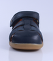 Roam showing the navy closed‑toe upper, side cut‑outs and ankle strap.