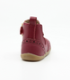 Billie showing the red leather upper, brogue details and inside zip.