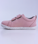 Grass Court showing the seashell‑pink leather upper, speckled sole and double straps.