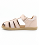 Roam showing the cameo‑rose closed‑toe upper, side openings and ankle strap.
