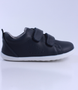 Grass Court showing the navy leather upper, white sole and double straps.