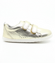Grass Court showing the pale‑gold leather upper, white sole and double straps.