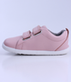 Grass Court showing the pink leather upper, white sole and double straps.