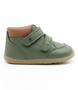 Timber Boot showing the green leather upper, padded collar and strap fastenings.