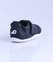 XP Go showing the navy leather upper, rounded toe and flexible low‑profile sole.