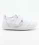 XP Go showing the white leather upper, rounded toe and flexible low‑profile sole.